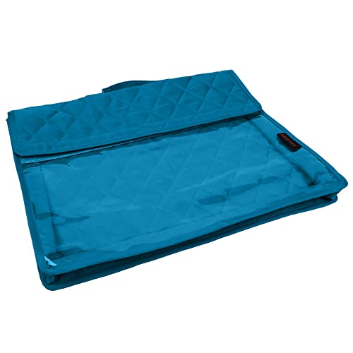 a blue bed with a blue blanket on top of it 