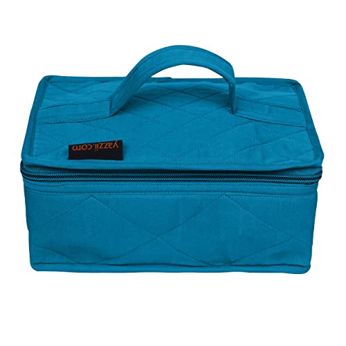 a blue suitcase sitting on a white surface 