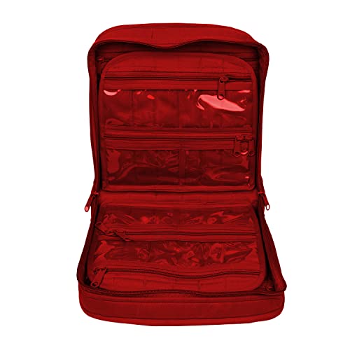 a red piece of luggage sitting on top of a table 